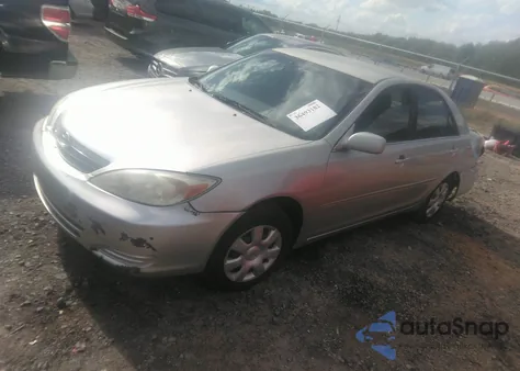 2004 Toyota Camry Le z USA, uszkodzony, nr VIN 4T1BE32K54U809675